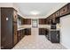 Spacious kitchen with ample cabinet storage and tile flooring at 409 Ivey Rd, Graham, NC 27253