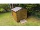 Wooden shed providing extra storage space in the backyard at 409 Ivey Rd, Graham, NC 27253
