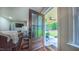 Open doorway into a beautiful living room. A peek at the outdoor porch and greenery at 41 Maple Cir, Pittsboro, NC 27312
