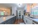 View of modern kitchen, dining area, and laundry area at 41 Maple Cir, Pittsboro, NC 27312