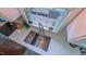 Aerial view of modern stainless steel kitchen sink with white countertops and a window at 41 Maple Cir, Pittsboro, NC 27312