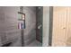 Tiled shower with a niche for storage at 41 Maple Cir, Pittsboro, NC 27312