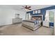 Spacious main bedroom with a ceiling fan, carpet floors, and complementary furniture at 412 Collington Dr, Mebane, NC 27302