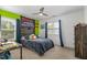 Bedroom with a ceiling fan, a bed with a cushioned headboard and a window with blinds at 412 Collington Dr, Mebane, NC 27302