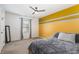 Bedroom features plush carpet, natural light from window, and modern ceiling fan for comfort at 412 Collington Dr, Mebane, NC 27302