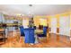 Open-concept kitchen and dining area featuring modern appliances, a pantry, and seamless access to adjacent rooms at 412 Collington Dr, Mebane, NC 27302
