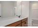 Bathroom featuring wood vanity with white countertop and shower over tub combo at 452 Golden Dragonfly St, Wake Forest, NC 27587
