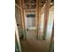 A view of a bathroom in the construction phase, showcasing the tub and the framing at 452 Golden Dragonfly St, Wake Forest, NC 27587