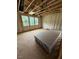 Bedroom construction featuring natural light, insulation, and wooden framing at 452 Golden Dragonfly St, Wake Forest, NC 27587