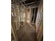 Hallway construction with exposed wood framing, ductwork, and plumbing at 452 Golden Dragonfly St, Wake Forest, NC 27587
