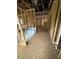 Hallway construction showcasing wood framing, plumbing lines, and open spaces at 452 Golden Dragonfly St, Wake Forest, NC 27587