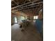 Unfinished living room space with exposed beams and framed walls at 452 Golden Dragonfly St, Wake Forest, NC 27587