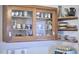 Kitchen cabinetry with glass doors and open shelves at 501 N Greensboro St, Carrboro, NC 27510