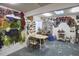 Bright studio featuring a skylight, lots of artwork on the walls and a table at 501 N Greensboro St, Carrboro, NC 27510