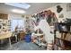 Bright studio featuring a skylight, lots of artwork on the walls and a shelf of books at 501 N Greensboro St, Carrboro, NC 27510