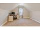 Bright home office with lots of space for a desk, chair, and storage at 518 Spruce Meadows Ln, Willow Springs, NC 27592