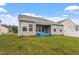 Spacious backyard with lush green lawn and small above ground pool, ideal for outdoor enjoyment at 57 S Great White Way, Clayton, NC 27527