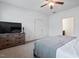 Spacious bedroom features neutral carpet and a large dresser, blending style and functionality at 57 S Great White Way, Clayton, NC 27527