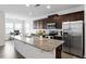 Bright and spacious kitchen featuring an island with granite countertops at 57 S Great White Way, Clayton, NC 27527
