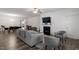 Bright living room featuring a fireplace, neutral paint and sleek furniture at 57 S Great White Way, Clayton, NC 27527
