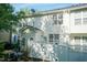 Well-maintained backyard exterior with a white fence, and lush green trees at 5742 Corbon Crest Ln, Raleigh, NC 27612
