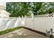 Fenced back yard featuring a concrete patio area and lush landscaping at 5742 Corbon Crest Ln, Raleigh, NC 27612