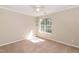 Bedroom featuring neutral walls, carpet floors, and a ceiling fan with overhead light at 5742 Corbon Crest Ln, Raleigh, NC 27612