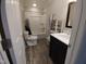 Clean bathroom featuring vanity with sink and a shower with a shower curtain at 623 Glenwood Dr, Sanford, NC 27330