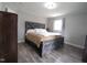 Comfortable bedroom has hard surface floors with neutral walls at 623 Glenwood Dr, Sanford, NC 27330