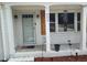 Close up of the front entrance showing the door, number, and porch area with decorations at 623 Glenwood Dr, Sanford, NC 27330