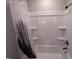 The bright shower area has a neutral surround and is ready to be used at 623 Glenwood Dr, Sanford, NC 27330