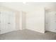 Neutral bedroom with a double door closet and plenty of space at 6521 Cablewood Dr, Raleigh, NC 27603