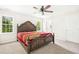 Large main bedroom with neutral colors, ceiling fan, and plenty of natural light from the windows at 6521 Cablewood Dr, Raleigh, NC 27603