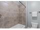 This bathroom features a built in tub and shower with decorative tile at 677 Juliette Ct, Creedmoor, NC 27522
