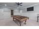This game room has wainscoting, carpeted floors, and a billiard table with accessories at 677 Juliette Ct, Creedmoor, NC 27522