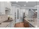 Kitchen features granite countertops, an island, stainless appliances, and gas cooktop at 677 Juliette Ct, Creedmoor, NC 27522