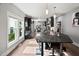 Bright, open kitchen with a center island, stainless appliances, and hardwood floors at 711 Hinsdale St, Raleigh, NC 27605