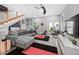 Open living area showcases modern staircase, hardwood floors, and natural light at 711 Hinsdale St, Raleigh, NC 27605