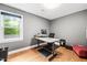 Minimalist office space with a large window providing ample natural light at 711 Hinsdale St, Raleigh, NC 27605