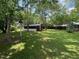 View of backyard and detached building at 727 Queens Ave, Dunn, NC 28334