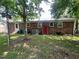 View of backyard and rear exterior of home at 727 Queens Ave, Dunn, NC 28334