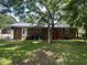 View of backyard and rear exterior of home at 727 Queens Ave, Dunn, NC 28334
