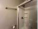 This bathroom has a glass door shower with a mounted shower head at 727 Queens Ave, Dunn, NC 28334