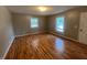 Spacious bedroom with wood flooring and ample natural light at 727 Queens Ave, Dunn, NC 28334
