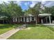 Charming front exterior with a well-manicured lawn at 727 Queens Ave, Dunn, NC 28334