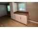 Cozy kitchen with granite countertops and ample cabinet storage at 727 Queens Ave, Dunn, NC 28334