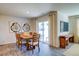 Inviting dining area with sliding doors to the outside and modern decor at 7461 Michelle Rd, Rocky Mount, NC 27803