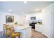 Updated kitchen features a large island with a sink and modern stainless steel appliances at 7461 Michelle Rd, Rocky Mount, NC 27803