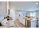 Modern kitchen with granite countertops, stainless steel appliances, and a center island with seating at 7461 Michelle Rd, Rocky Mount, NC 27803