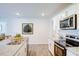 Modern kitchen features granite countertops, stainless steel appliances, and a center island with a sink at 7461 Michelle Rd, Rocky Mount, NC 27803